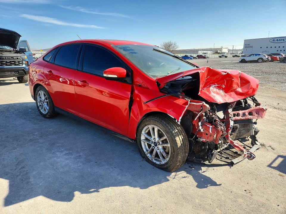 Photo 4 from auction – 2015 FORD FOCUS with VIN 1FADP3F20FL249774