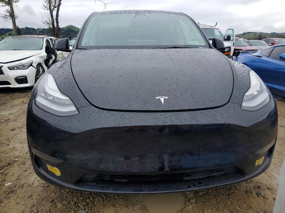 Photo 5 from auction – 2022 TESLA MODEL Y with VIN 7SAYGDEE6NF571126