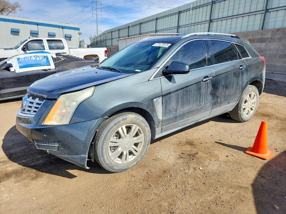 CADILLAC SRX 2014 z numerem VIN 3GYFNBE33ES543329 - Zdjęcie z aukcji