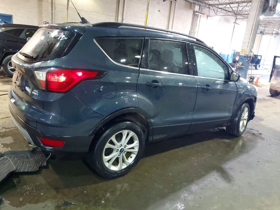 Photo 3 from auction – 2019 FORD ESCAPE with VIN 1FMCU9HD1KUA77092