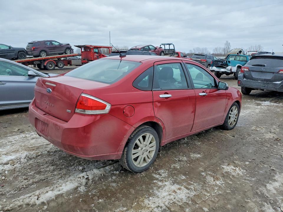 Photo 3 from auction – 2011 FORD FOCUS with VIN 1FAHP3HN3BW146107