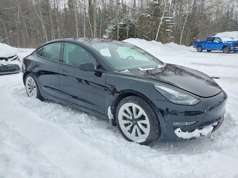 Photo 4 from auction – 2022 TESLA MODEL 3 with VIN 5YJ3E1EA7NF169673