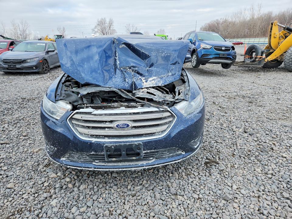 Photo 5 from auction – 2016 FORD TAURUS with VIN 1FAHP2E8XGG107539