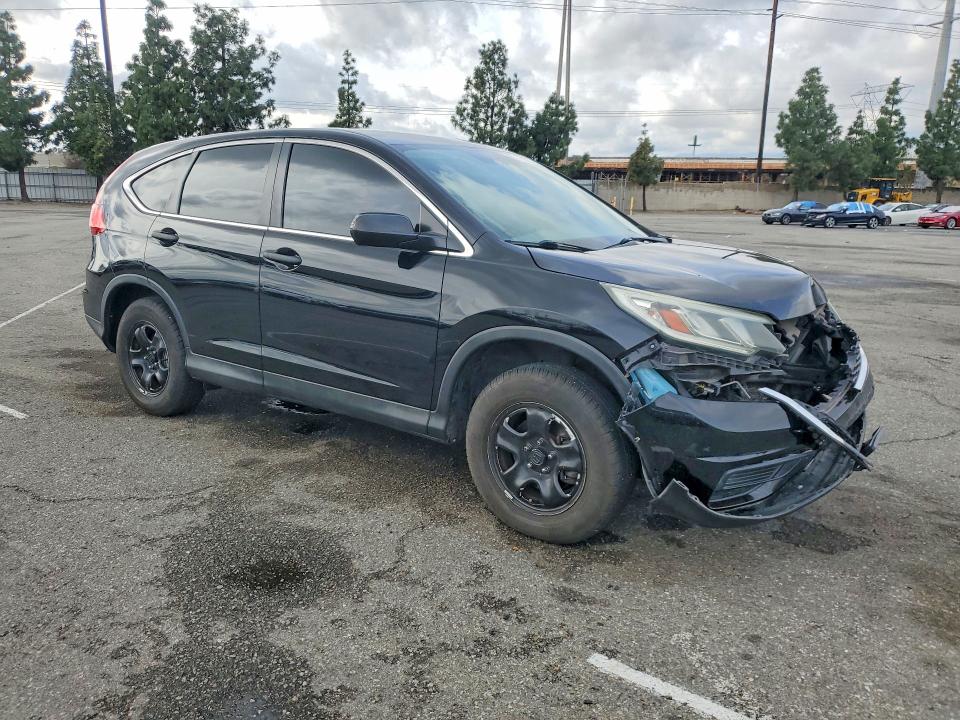 Photo 4 from auction – 2015 HONDA CR-V LX with VIN 2HKRM4H35FH644722