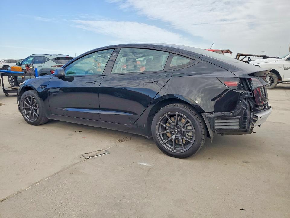 Photo 2 from auction – 2021 TESLA MODEL 3 with VIN 5YJ3E1EA0MF027440