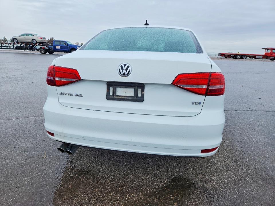 Photo 6 from auction – 2015 VOLKSWAGEN JETTA with VIN 3VWLA7AJ0FM332257