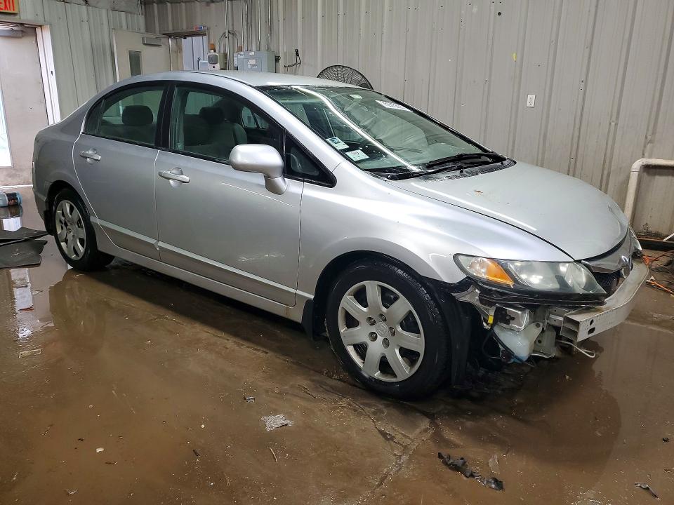 Foto 4 de la subasta – 2010 HONDA CIVIC con VIN 19XFA1F55AE074278