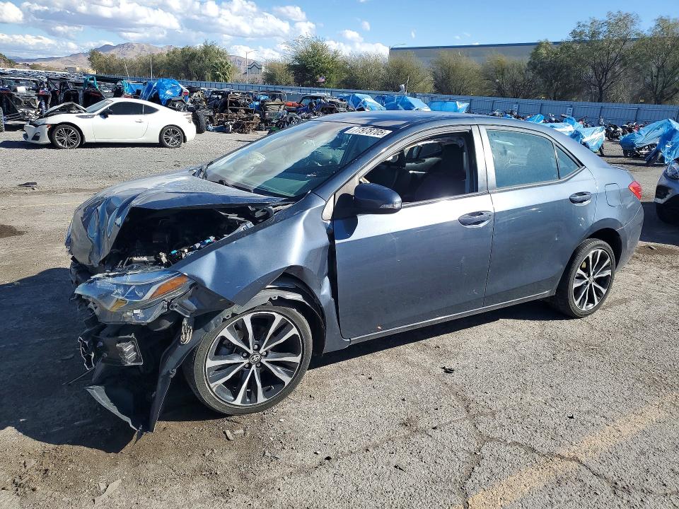 TOYOTA COROLLA 2018 with VIN 5YFBURHE7JP792561 - Photo from auction