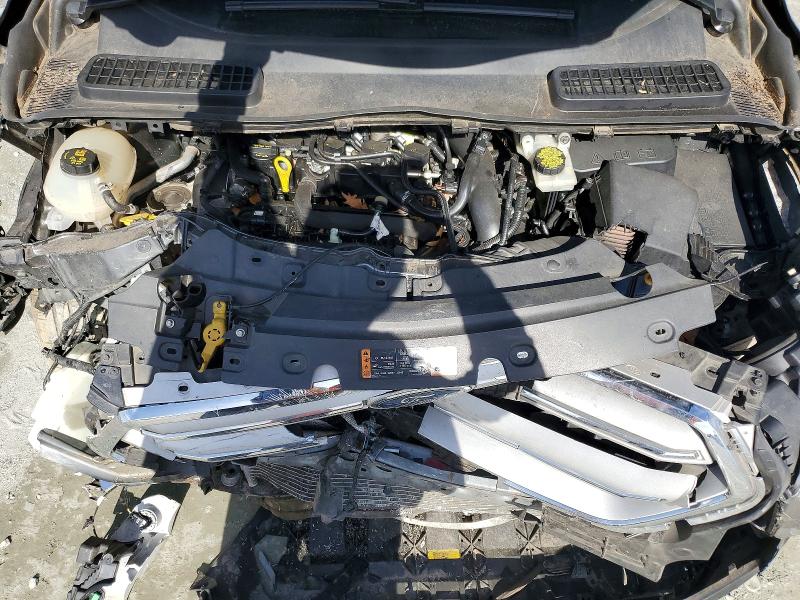Photo 12 from auction – 2019 FORD ESCAPE with VIN 1FMCU9GD2KUB20422
