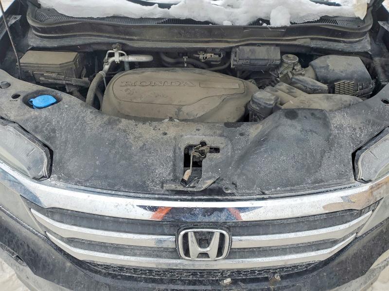 Photo 12 from auction – 2016 HONDA PILOT with VIN 5FNYF6H51GB037851