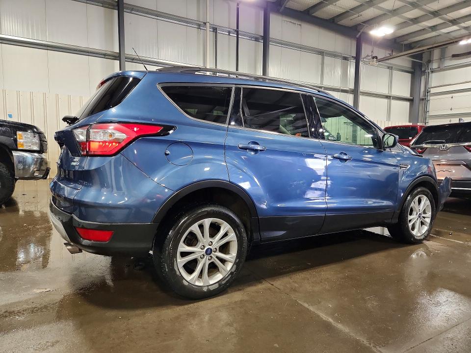 Photo 3 from auction – 2018 FORD ESCAPE with VIN 1FMCU9HD8JUC88465