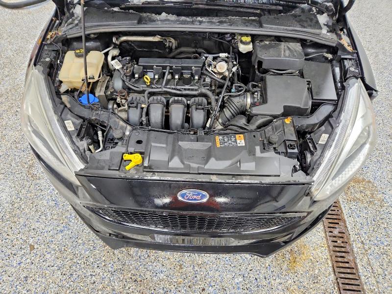 Photo 11 from auction – 2017 FORD FOCUS with VIN 1FADP3F23HL259184