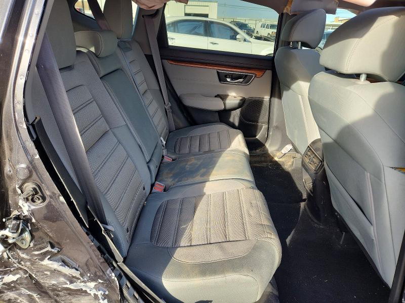 Photo 11 from auction – 2018 HONDA CR-V with VIN 7FARW1H50JE030652