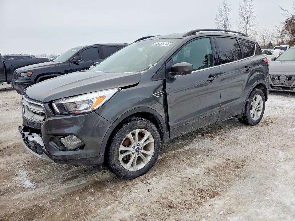 FORD ESCAPE 2018 with VIN 1FMCU0GD7JUD39483 - Photo from auction