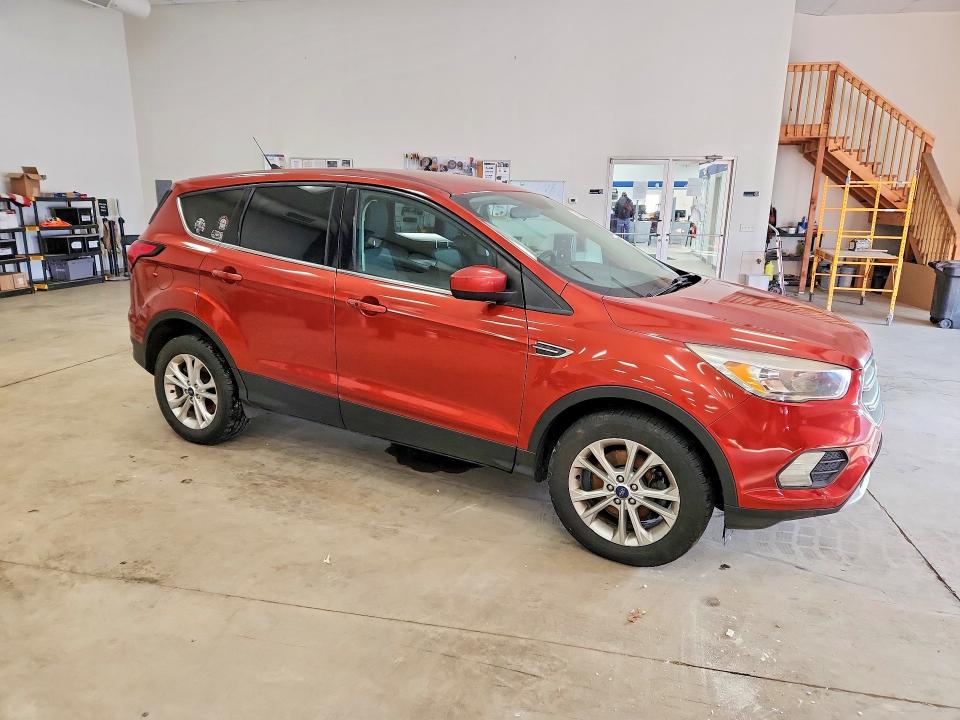 Photo 4 from auction – 2019 FORD ESCAPE with VIN 1FMCU9GD8KUB56261