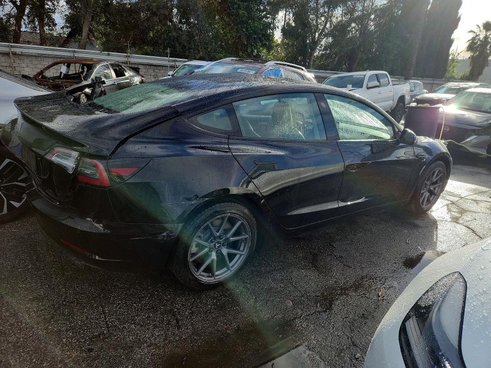 Photo 3 from auction – 2022 TESLA MODEL 3 with VIN 5YJ3E1EA7NF288484