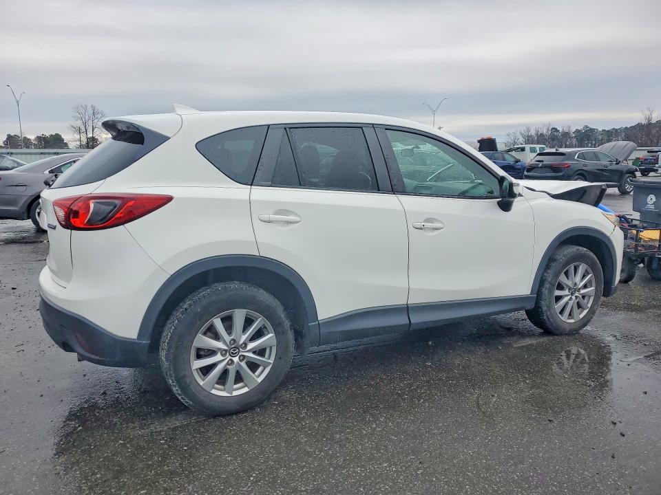 Photo 3 from auction – 2016 MAZDA CX-5 TOURI with VIN JM3KE2CY0G0609954