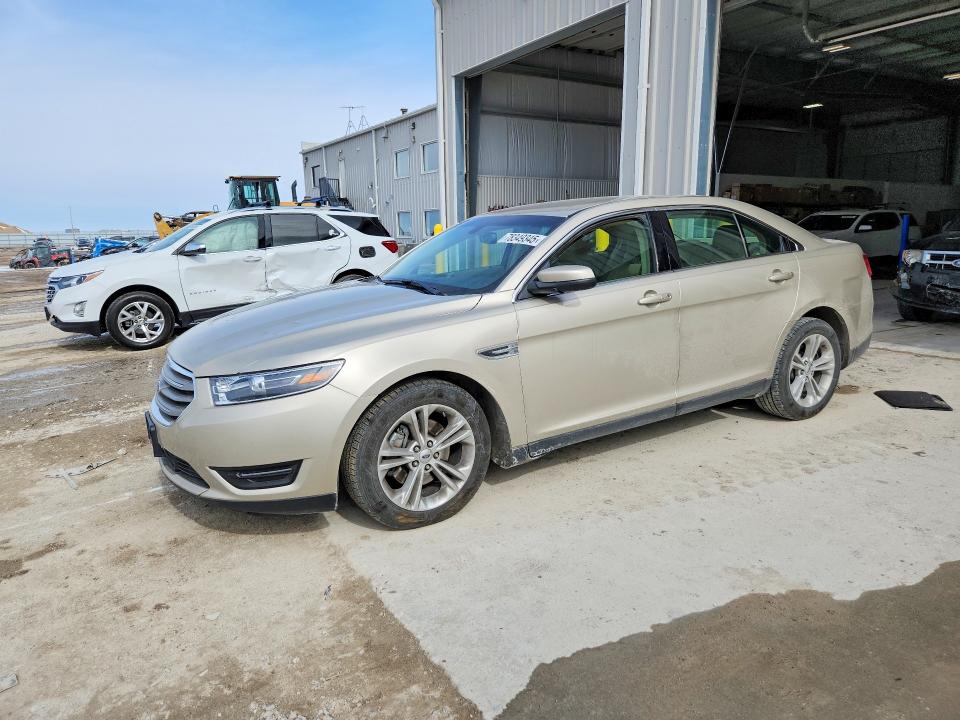 FORD TAURUS 2018 with VIN 1FAHP2E85JG125261 - Photo from auction