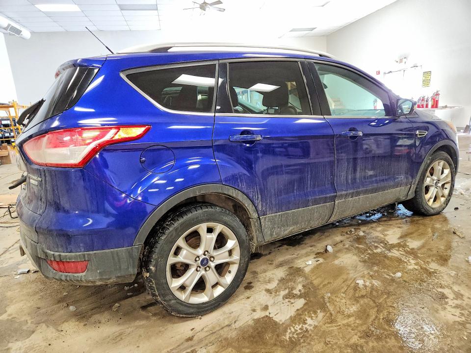 Photo 3 from auction – 2015 FORD ESCAPE TIT with VIN 1FMCU9J96FUC42176