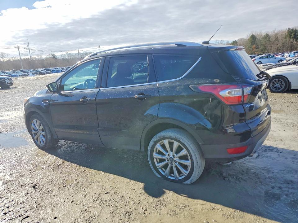 Photo 2 from auction – 2017 FORD ESCAPE with VIN 1FMCU9J93HUB03772