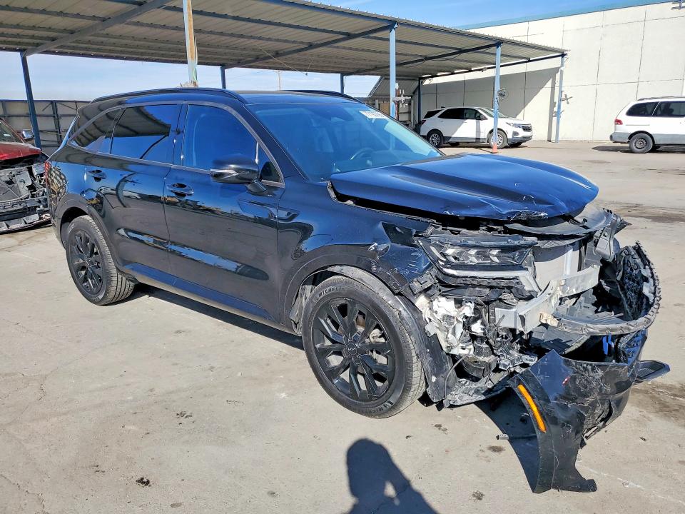 Photo 4 from auction – 2023 KIA SORENTO with VIN 5XYRK4LFXPG203068