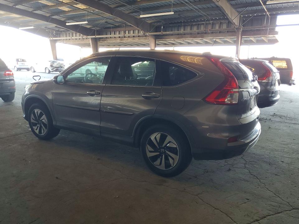 Photo 2 from auction – 2016 HONDA CR-V TOURI with VIN 5J6RM4H97GL081636
