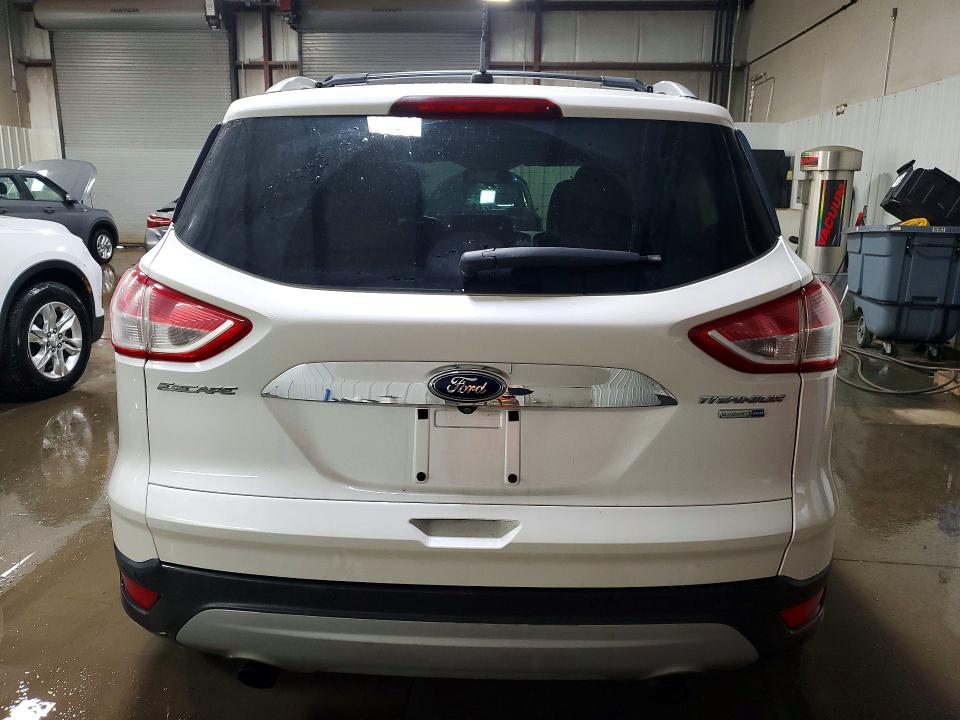 Photo 6 from auction – 2014 FORD ESCAPE TIT with VIN 1FMCU9J92EUD65942