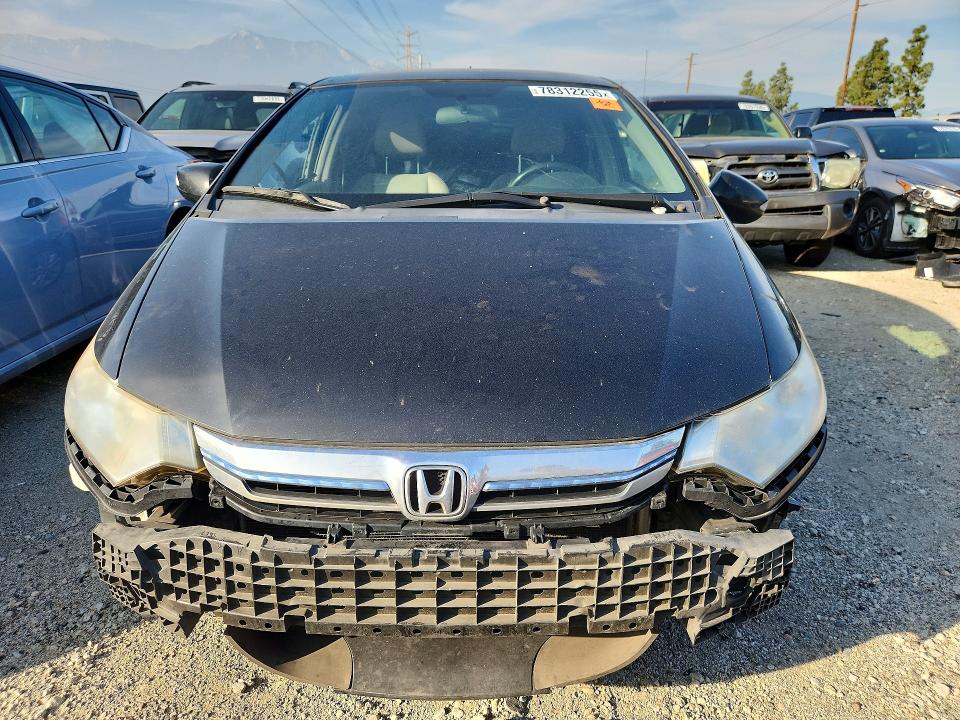 Photo 5 from auction – 2014 HONDA INSIGHT with VIN JHMZE2H72ES002476