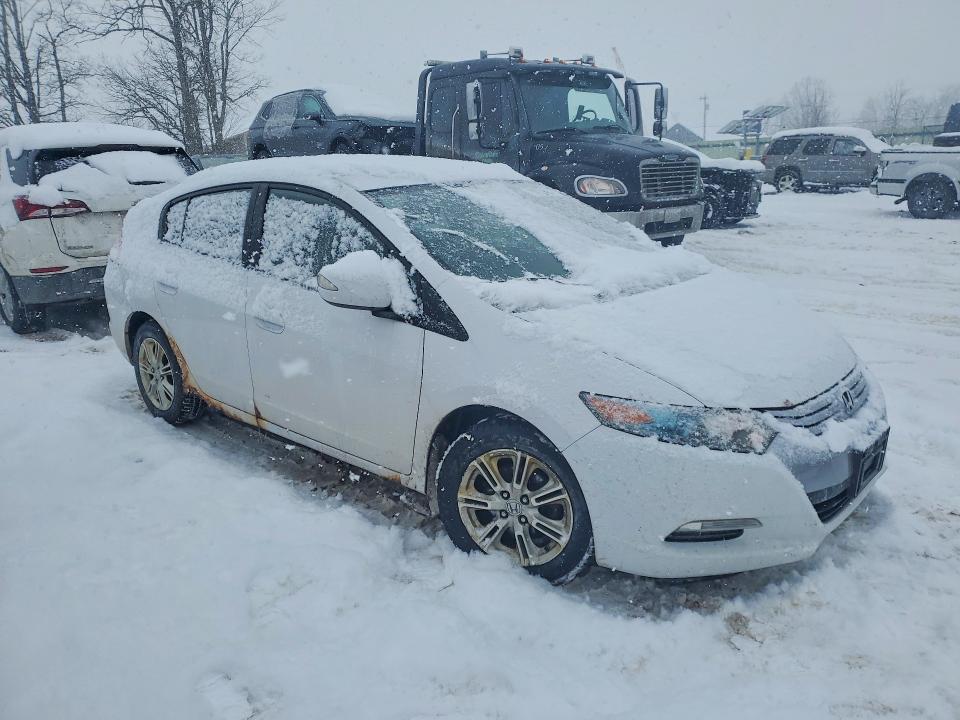 Photo 4 from auction – 2010 HONDA INSIGHT with VIN JHMZE2H75AS036793