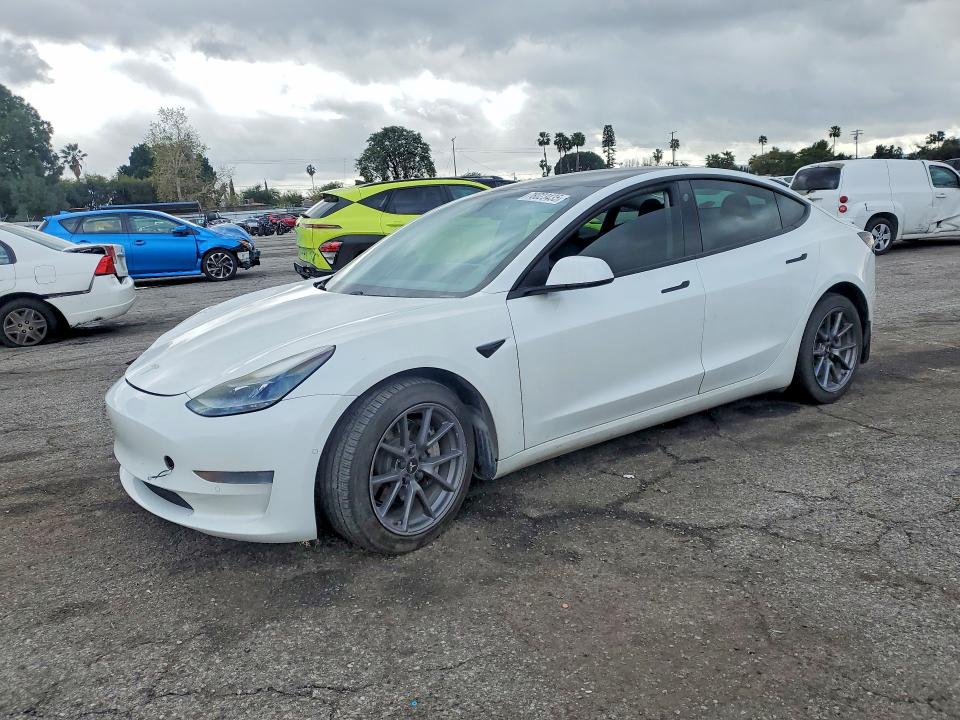 TESLA MODEL 3 2021 with VIN 5YJ3E1EA3MF867731 - Photo from auction