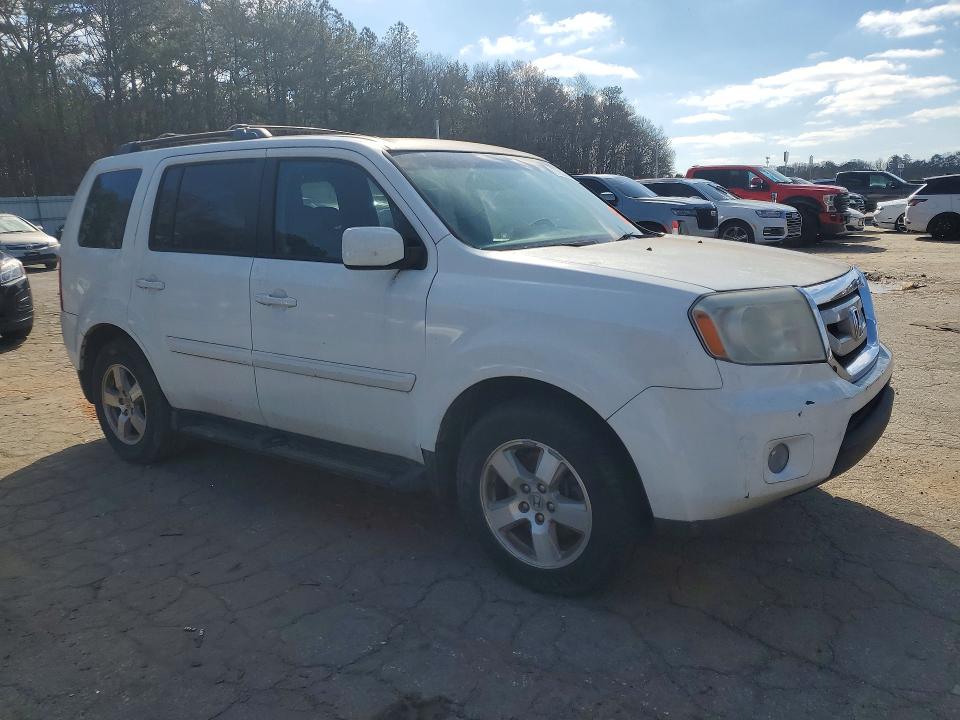 Photo 4 from auction – 2011 HONDA PILOT with VIN 5FNYF4H7XBB069759