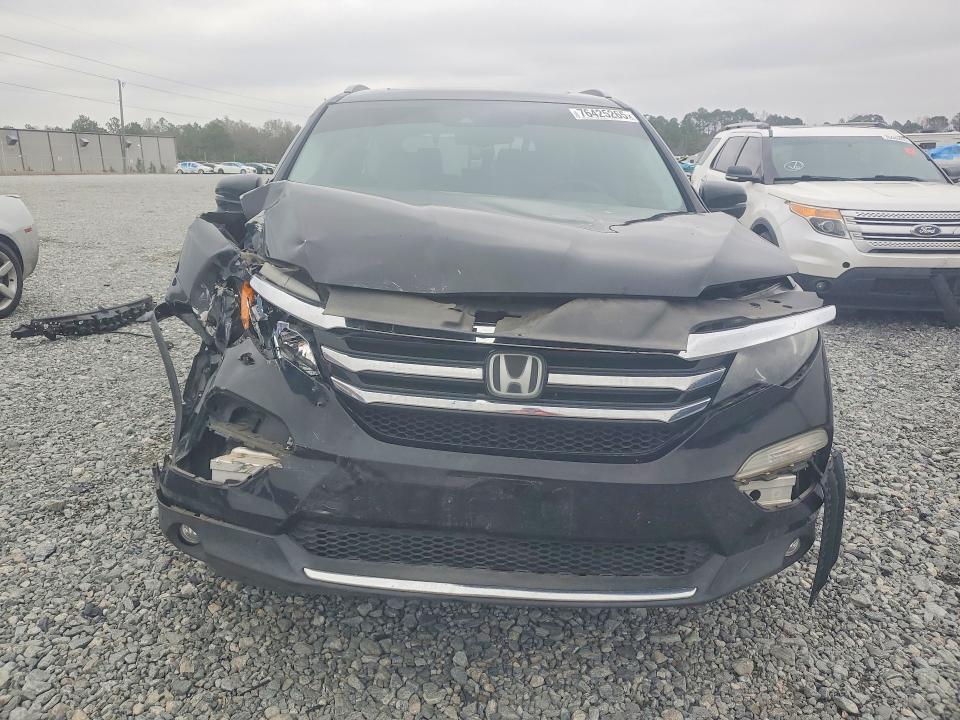 Photo 5 from auction – 2016 HONDA PILOT with VIN 5FNYF5H92GB053456