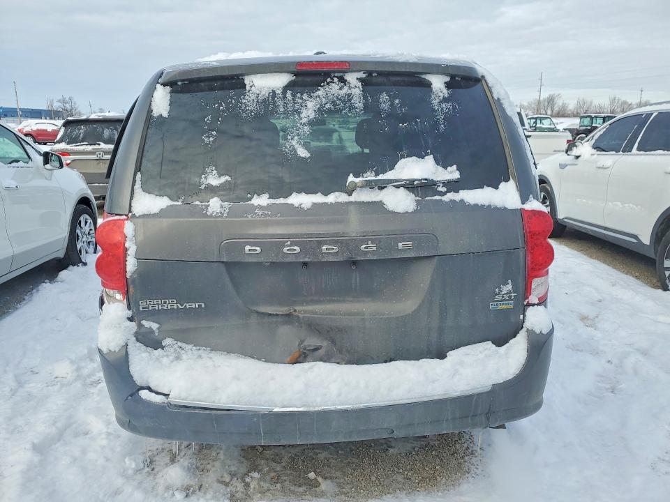 Фото 6 с аукциона – 2016 DODGE GRAND CARA с VIN 2C4RDGCG1GR234581