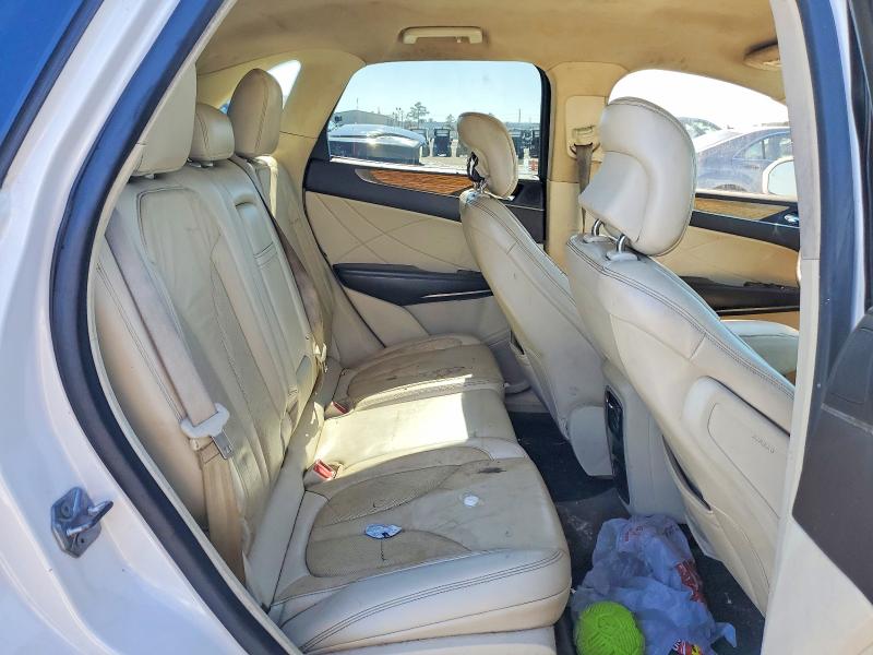 Фото 11 с аукциона – 2015 LINCOLN MKC с VIN 5LMCJ1A98FUJ41891