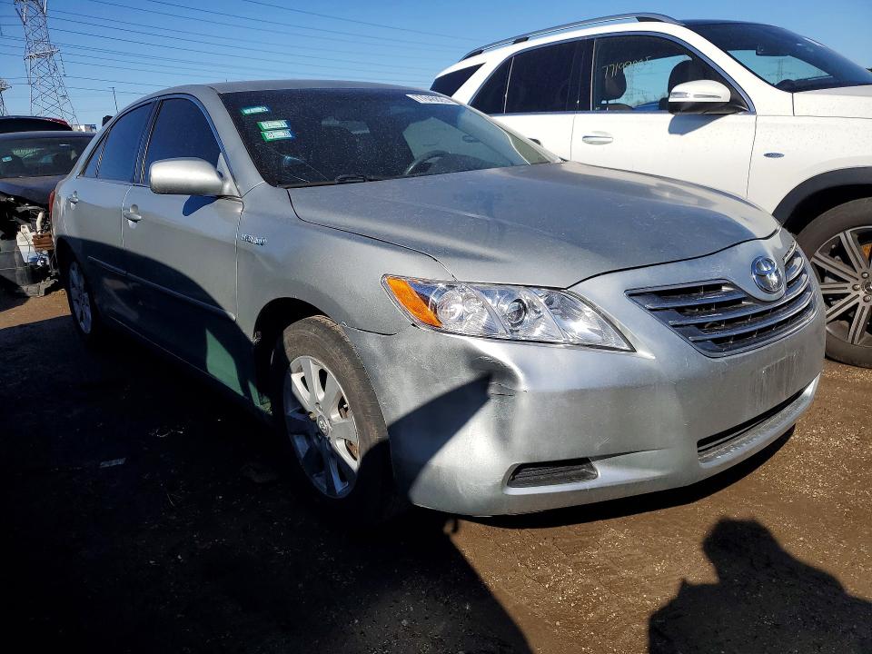 Photo 4 from auction – 2007 TOYOTA CAMRY HYBR with VIN JTNBB46K473023028