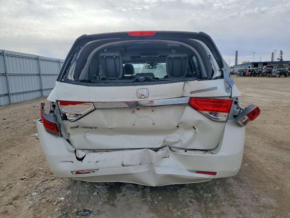 Photo 6 from auction – 2016 HONDA ODYSSEY with VIN 5FNRL5H61GB140347