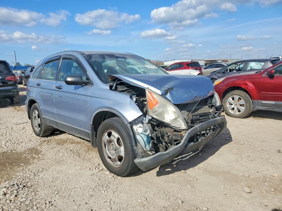 Photo 4 from auction – 2011 HONDA CR-V with VIN JHLRE3H33BC007750