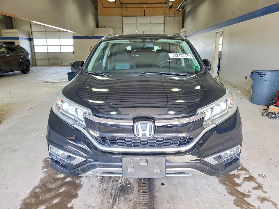 Photo 5 from auction – 2016 HONDA CR-V with VIN 2HKRM4H70GH709495