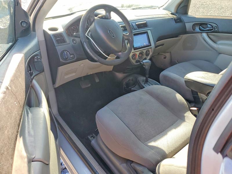 Photo 8 from auction – 2007 FORD FOCUS with VIN 1FAFP31N87W334890