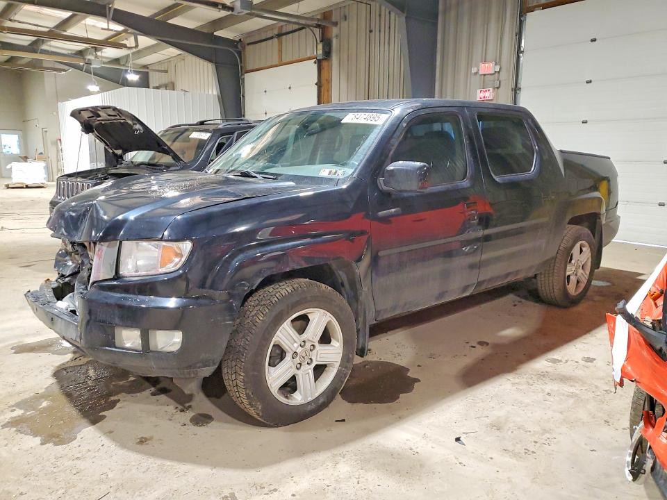 HONDA RIDGELINE 2013 z numerem VIN 5FPYK1F50DB012881 - Zdjęcie z aukcji