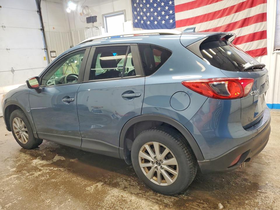 Photo 2 from auction – 2015 MAZDA CX-5 with VIN JM3KE4CY4F0521726