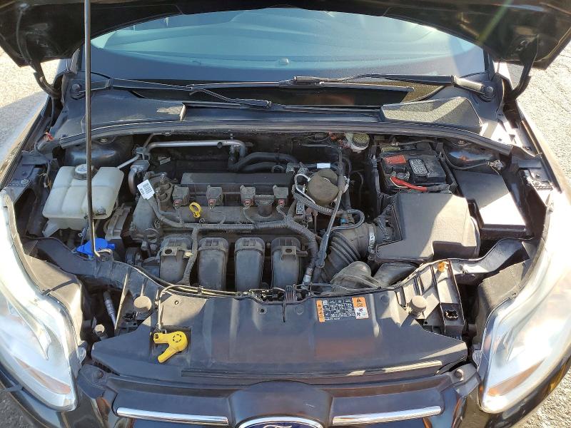 Photo 11 from auction – 2014 FORD FOCUS with VIN 1FADP3F20EL366205