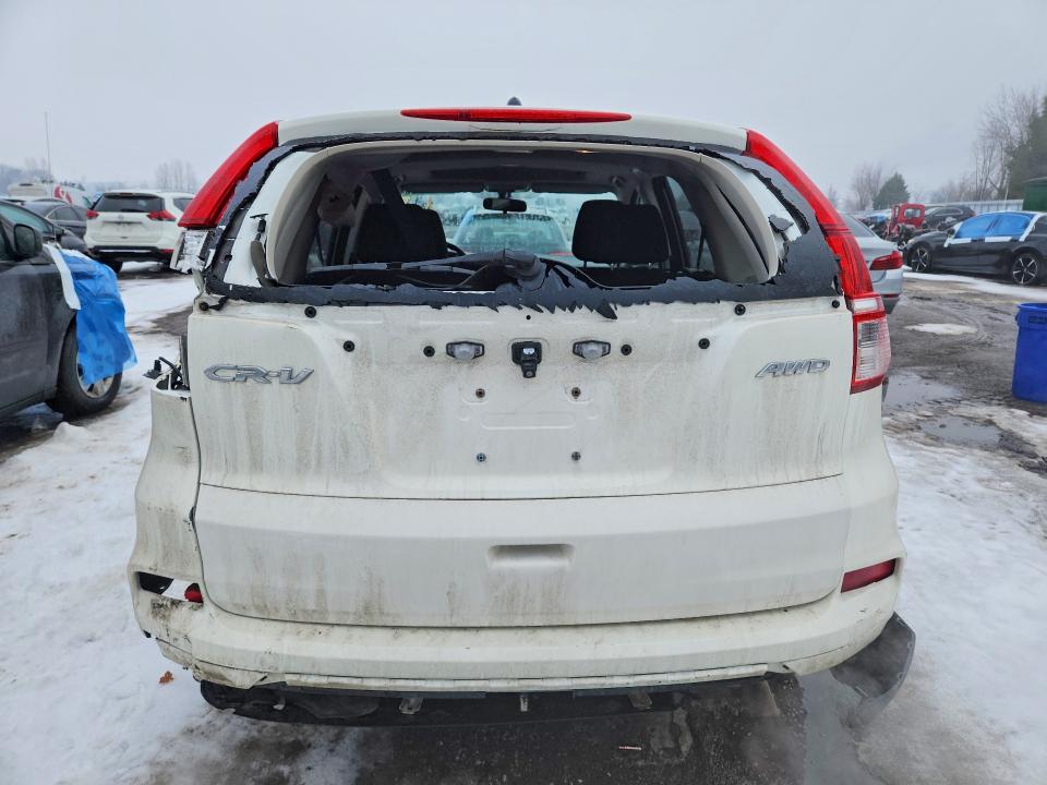 Photo 6 from auction – 2016 HONDA CR-V with VIN 2HKRM4H52GH106207