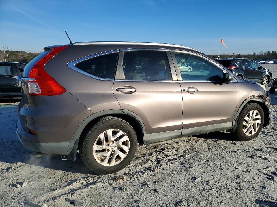 Photo 3 from auction – 2015 HONDA CR-V with VIN 2HKRM3H78FH557510