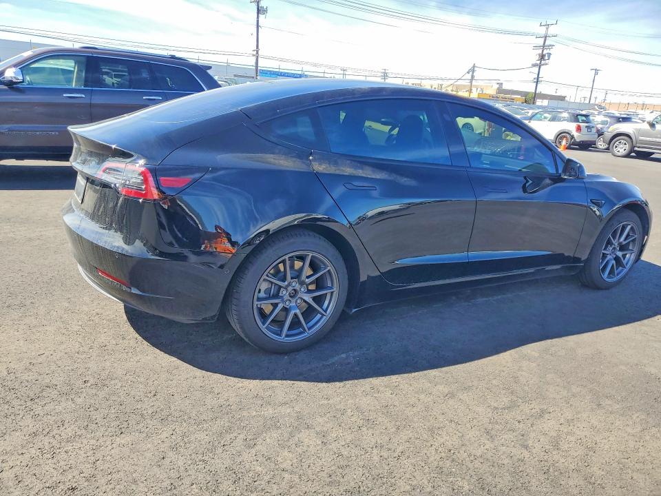 Photo 3 from auction – 2022 TESLA MODEL 3 with VIN 5YJ3E1EA9NF199810