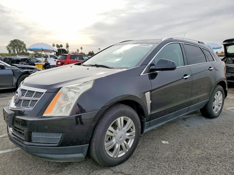 CADILLAC SRX 2011 con VIN 3GYFNAEY0BS658200 - Foto de la subasta