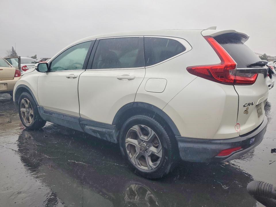 Photo 2 from auction – 2018 HONDA CR-V EX with VIN 2HKRW2H52JH631869
