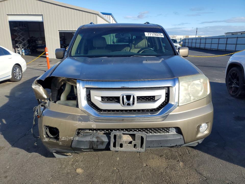 Photo 5 from auction – 2010 HONDA PILOT EXL with VIN 5FNYF3H55AB019505