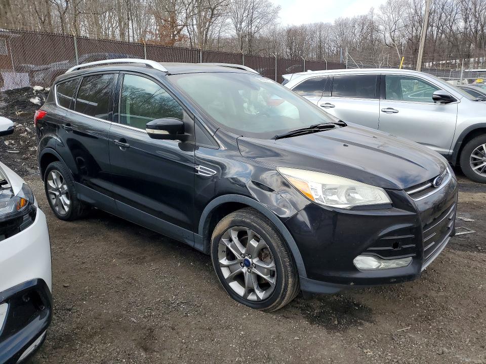 Photo 4 from auction – 2016 FORD ESCAPE TIT with VIN 1FMCU9JX4GUC06650