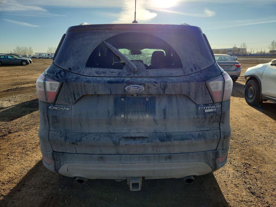 Foto 6 de la subasta – 2017 FORD ESCAPE TIT con VIN 1FMCU9J91HUA33334